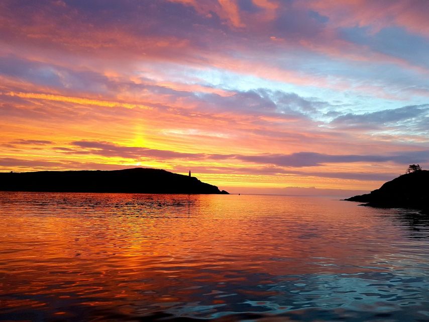 Baltimore Harbor: Sunset Cruise to Fastnet Rock Lighthouse - Circling Fastnet Rock Lighthouse for real angle variety