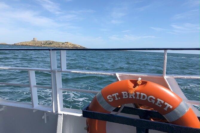 Boat Trip from Howth to Dun Laoghaire - Howth Head and the Baily Lighthouse: the classic camera moment