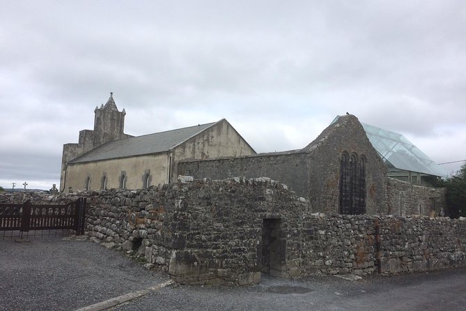 Burren Guided Electric Bike tour with Poulnabrone Portal Tomb - Stop 2, Noughaval Church and the graveyard market stone
