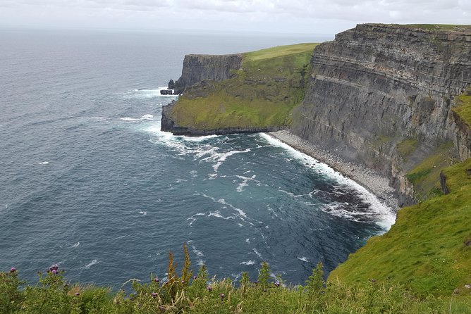 Cliffs of Moher & Burren Day Tour with a 2 hour stop at Cliffs - The Burren’s grey hills and a 12th-century Cistercian ruin stop