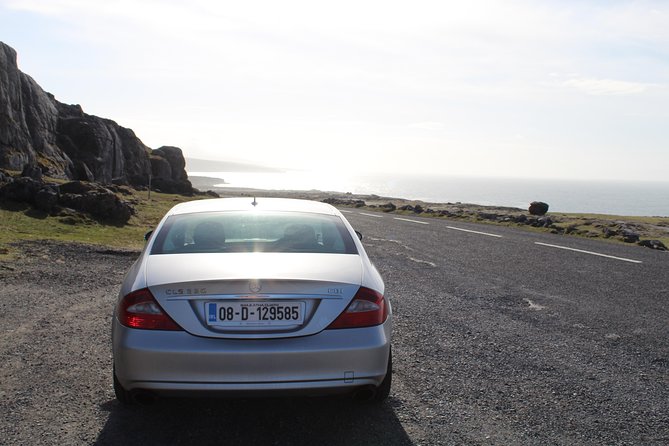 Cliffs of Moher including Cliffs of Moher Boat Experience Luxury Car Tour - Two perspectives, one day: how the land-to-sea plan pays off
