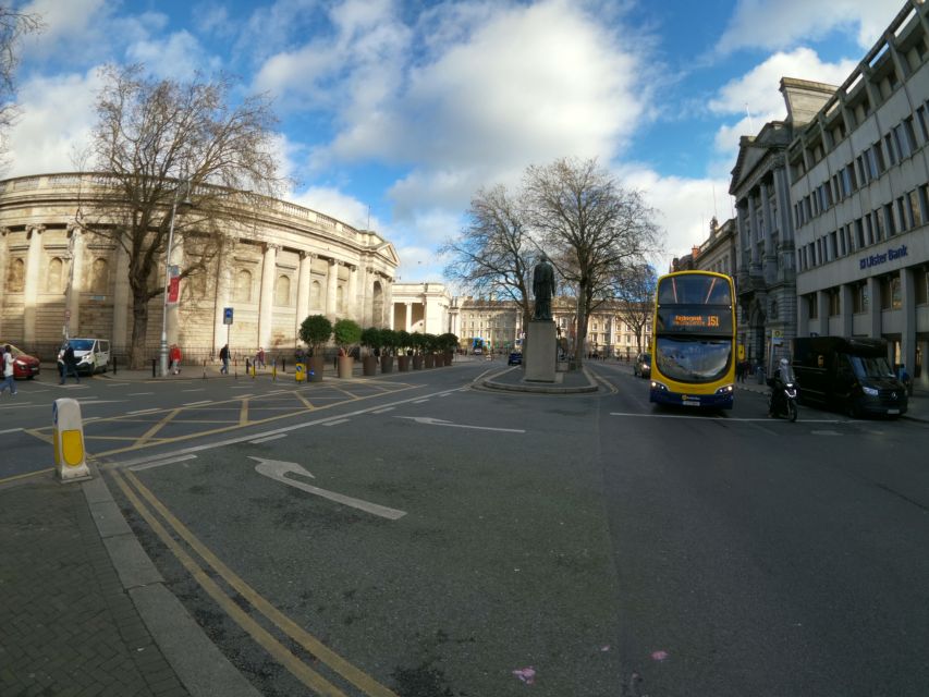 Dublin: Dublin City Highlights Private Guided Walking Tour - Hapenny Bridge at day and night: a short stop with a big payoff