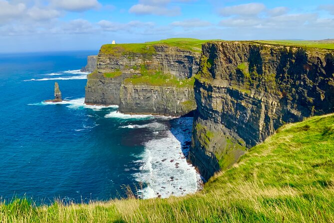 Private Day Trip to the Cliffs of Moher from Dublin - Wild Atlantic Way coast stop: rugged coastline, beach views, and a calmer pace